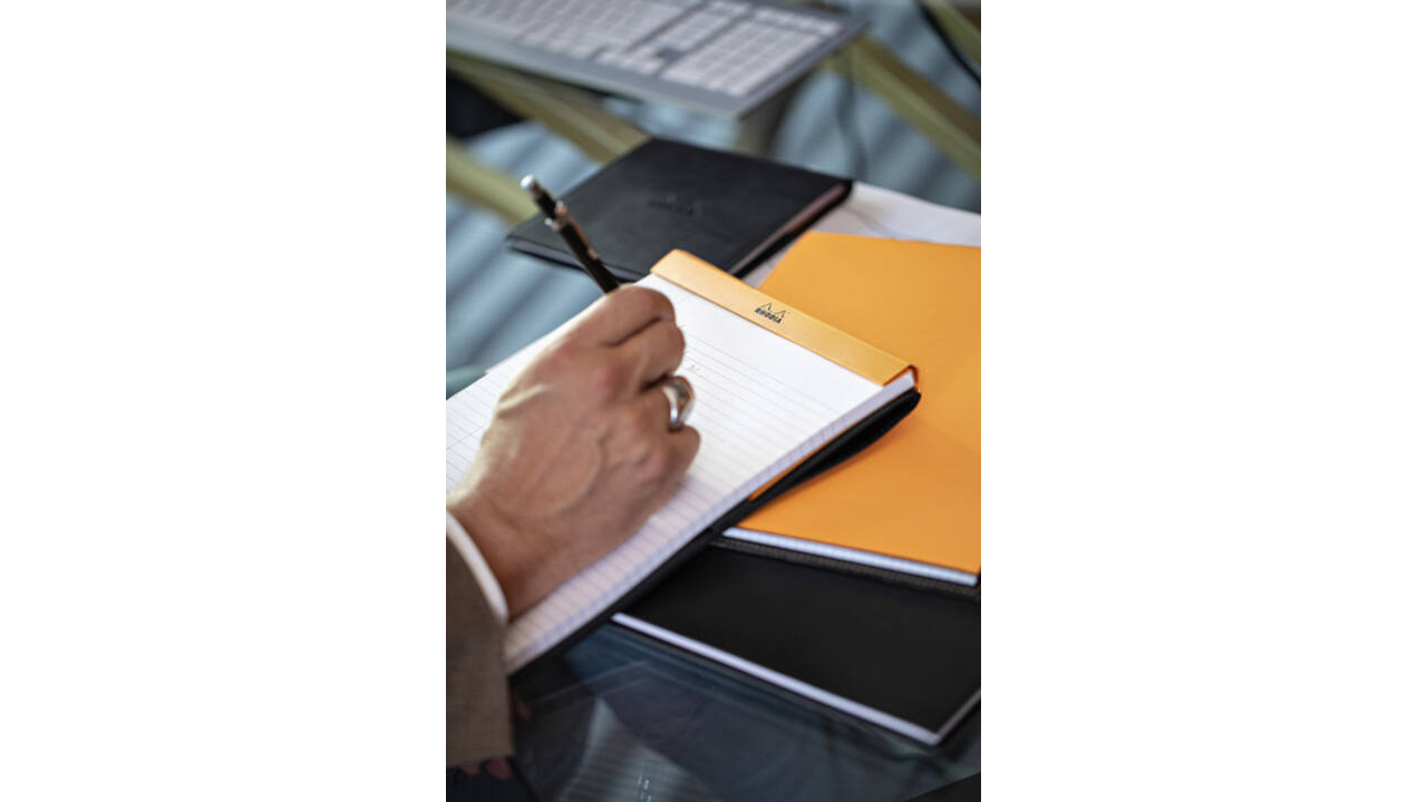 Schrijfblok Rhodia A5 lijn 80 vel 80gr met kantlijn oranje